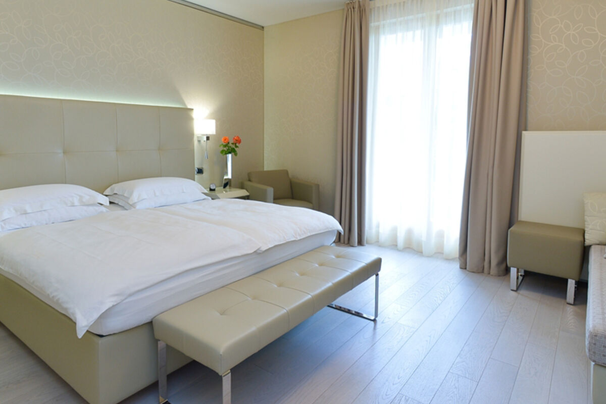 Junior Suite con Vista Giardino nella Suite House - Indipendenza, privacy e comfort 