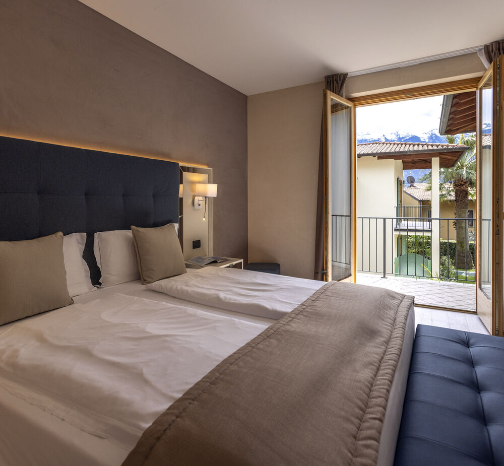 Suite con Vista Lago Parziale nella Suite House - Relax all’insegna della morbidezza
