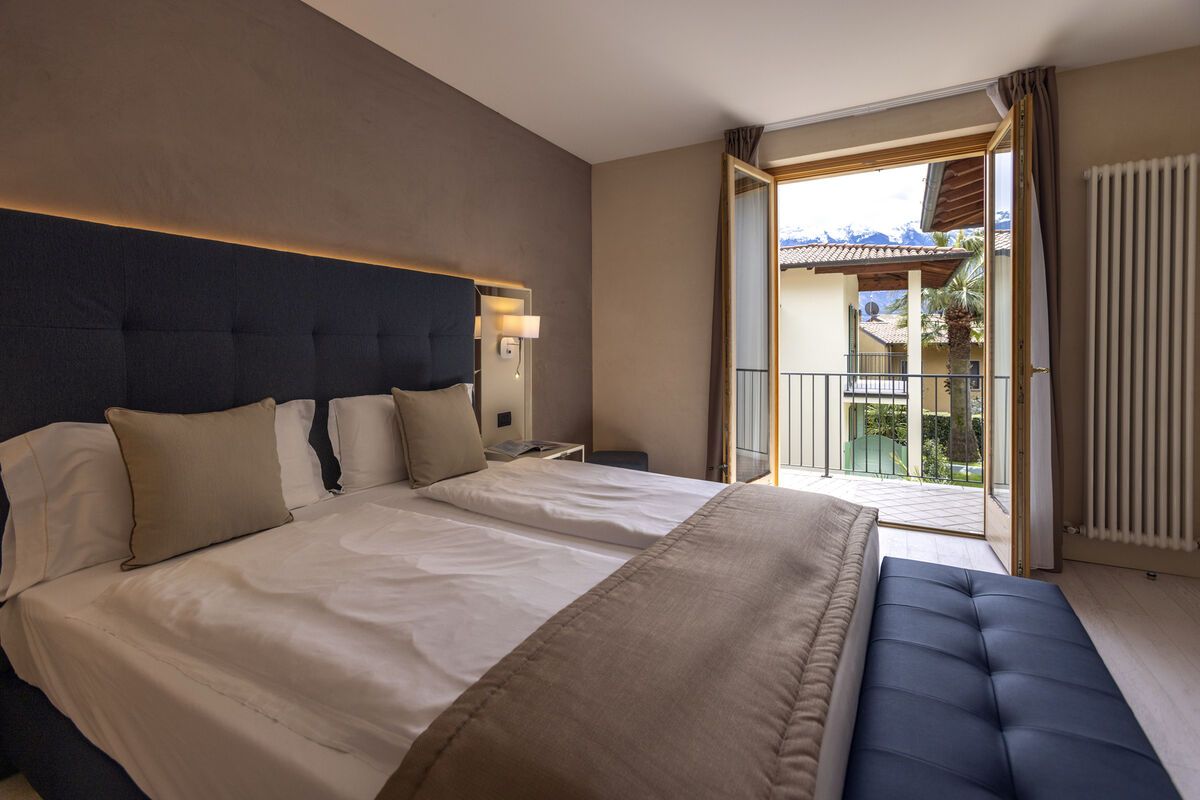 Suite con Vista Lago Parziale nella Suite House - Relax all’insegna della morbidezza