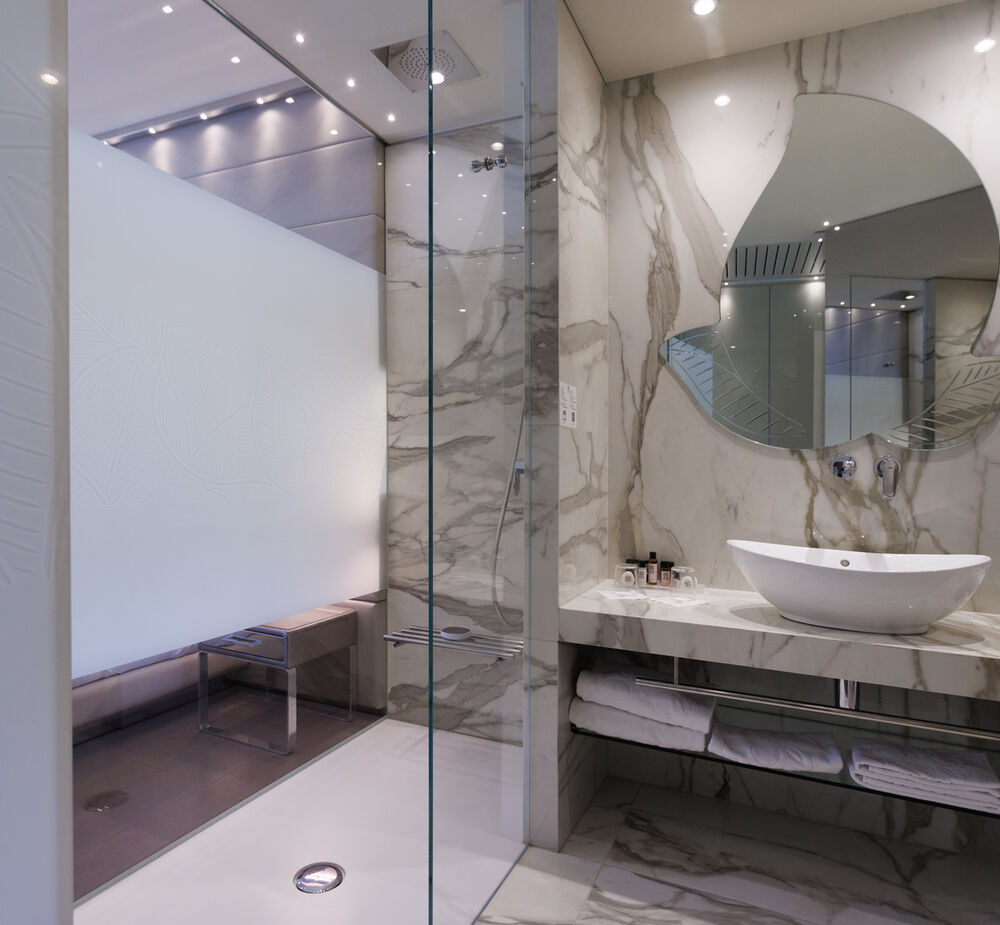 Junior Suite mit teilweisem Seeblick - Licht, Glas und moderne Eleganz